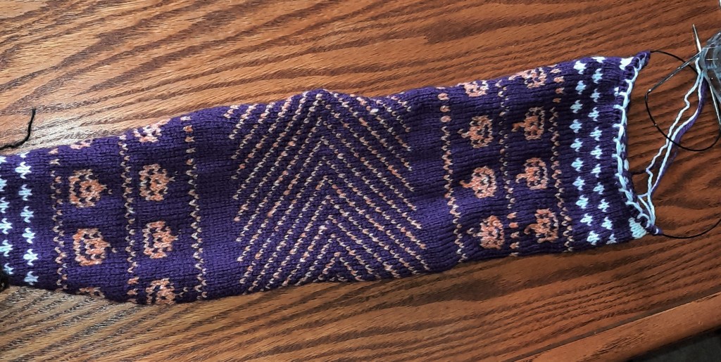 halfway point of scarf and reversal of pattern